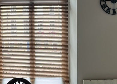 Serene window view through wooden blinds at Palms of Health, London, England, GB, enhancing relaxation.