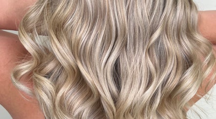 Flowing blonde waves styled at G R Hair Studio, Truro, England, GB.