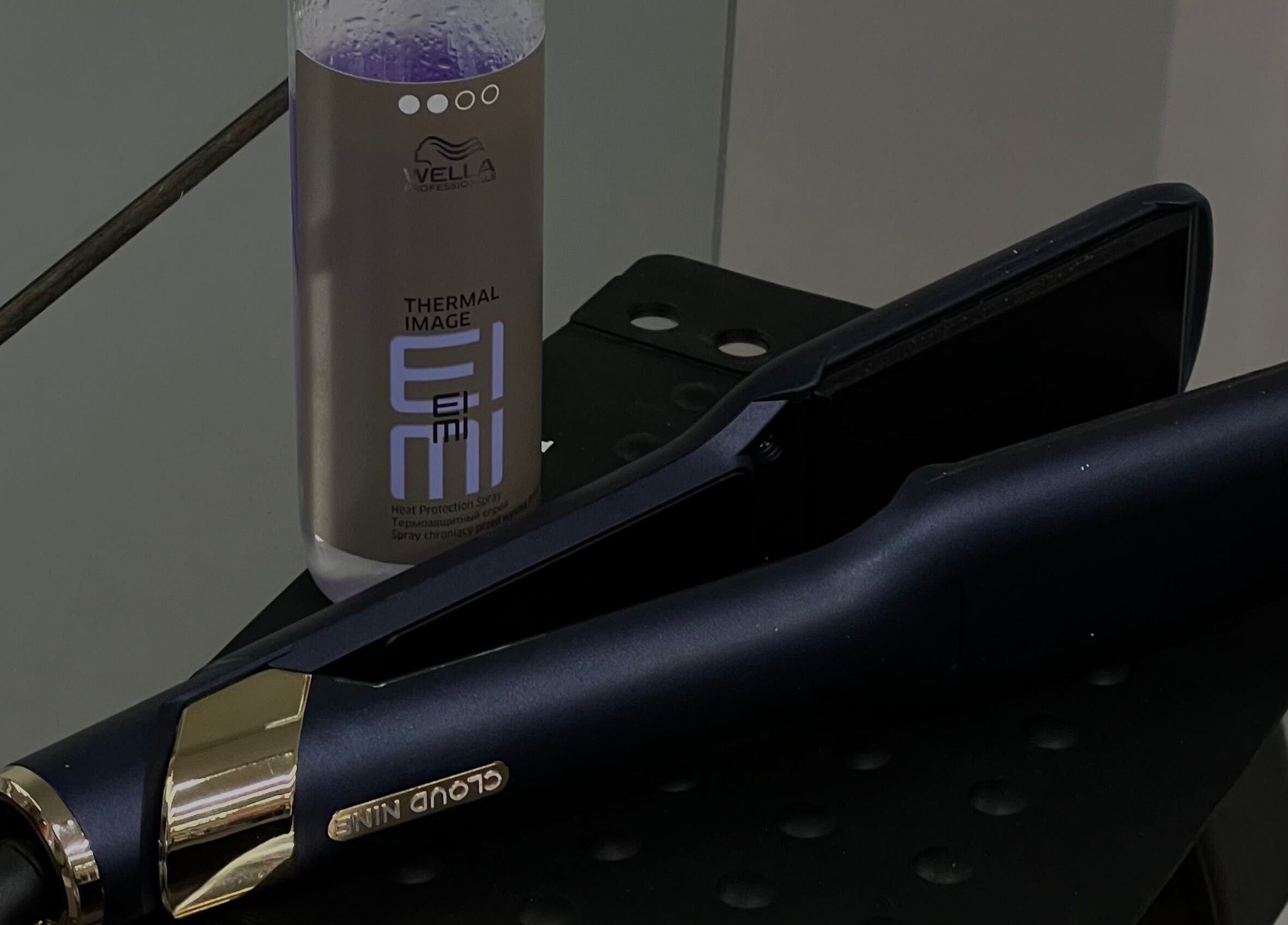 Professional styling tools at G R Hair Studio, Truro, England, GB. Includes flat iron and product.