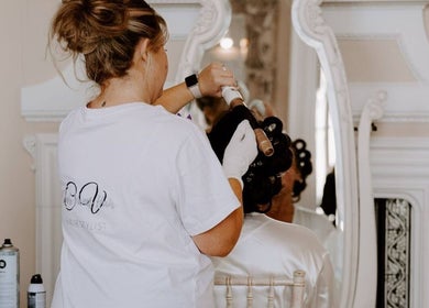 Hairstylist working on a client at Clair Vanes Hair, Bilston, England, GB.