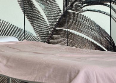 Relaxing massage table in By Atinem, Capelle Aan Den Ijssel, Zuid-holland, NL with elegant decor.