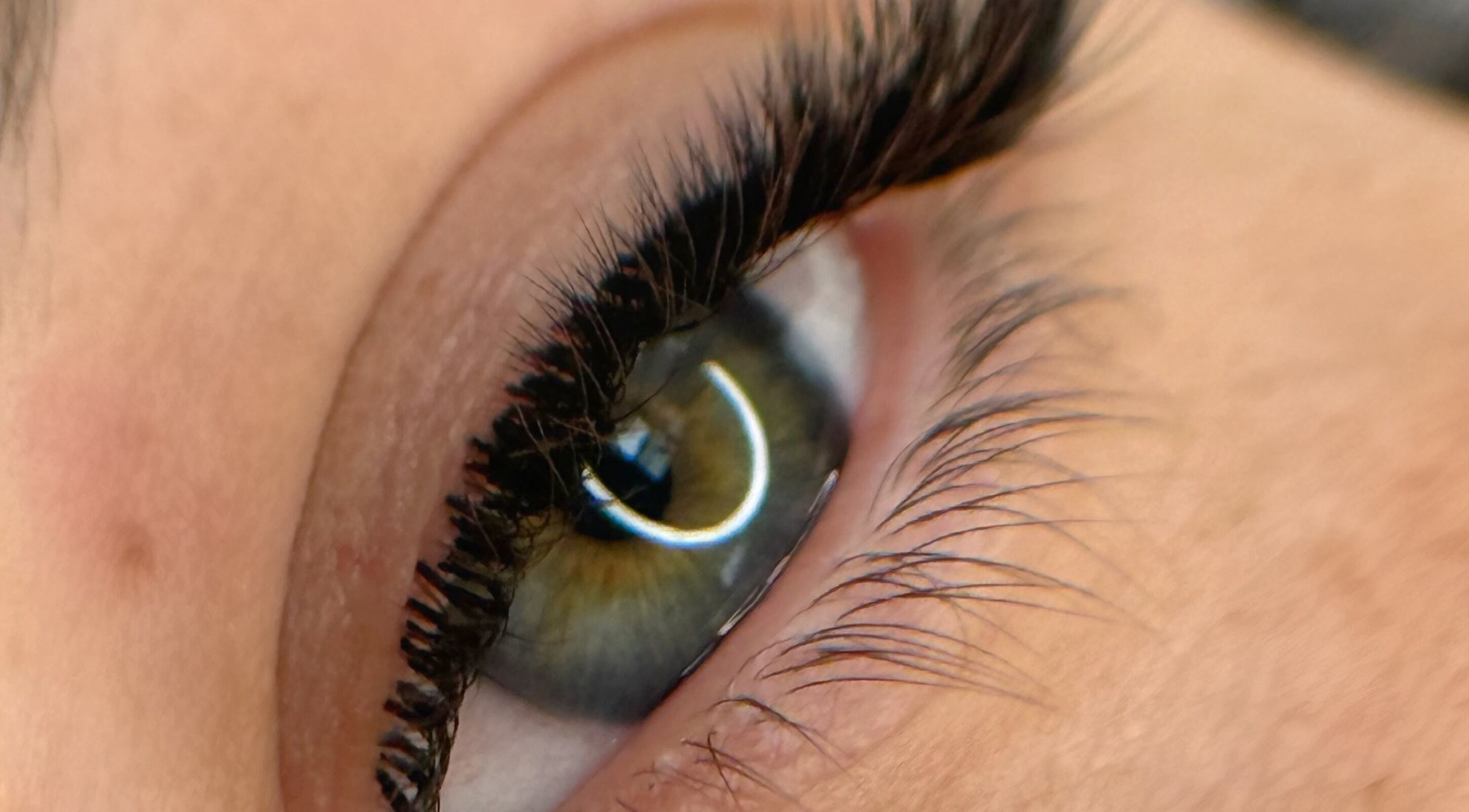Close-up of eye with lush lashes at Bairbeauty, Chudleigh, England, GB.