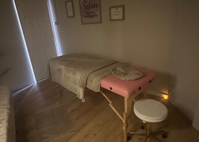 Tranquil massage room at Serenity by Alice, York, England, GB, featuring a cozy table and calm atmosphere.