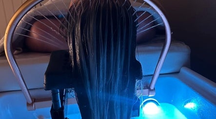 Relaxing hair spa treatment with water jets at Rose Glow Spa, Thomasville, Georgia, US.