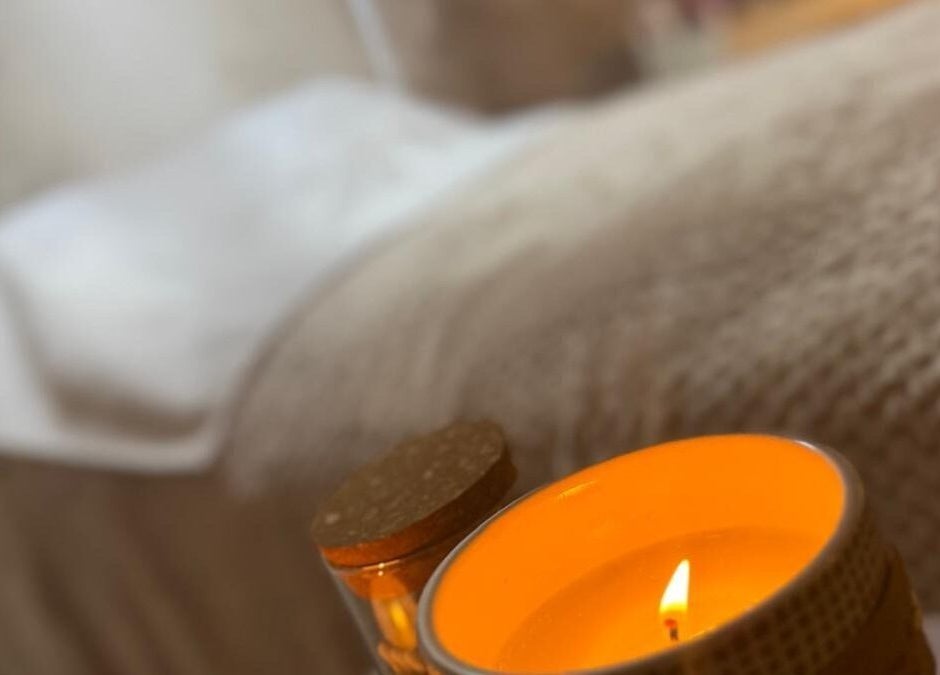 Tranquil spa setting at K&S Beauty & Aesthetics, Redditch, England with a warm candle ambiance.