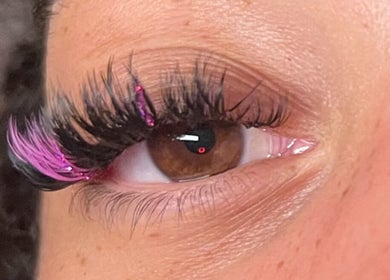 Close-up of vibrant colorful lashes at Eye Candy Lashes, Barrie, Ontario, CA, showcasing detailed lash artistry.