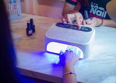 Gel manicure at MeNail - Hang Lekir, Senayan, Daerah Khusus Ibukota Jakarta, glowing under UV light.