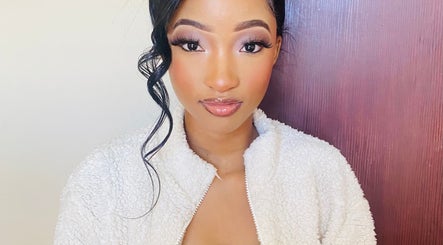 A woman with elegant makeup at KAYLUX BEAUTY SALON, Kimberley, Northern Cape, ZA.