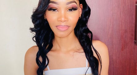 Client with flawless makeup at KAYLUX BEAUTY SALON in Kimberley, Northern Cape, ZA.
