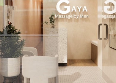 Entrance of Gaya Massage, featuring elegant decor and plants in Darlinghurst, New South Wales, AU.