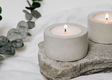 Serene candle arrangement at Gaya Massage, Darlinghurst, New South Wales, AU, creating a tranquil ambiance.