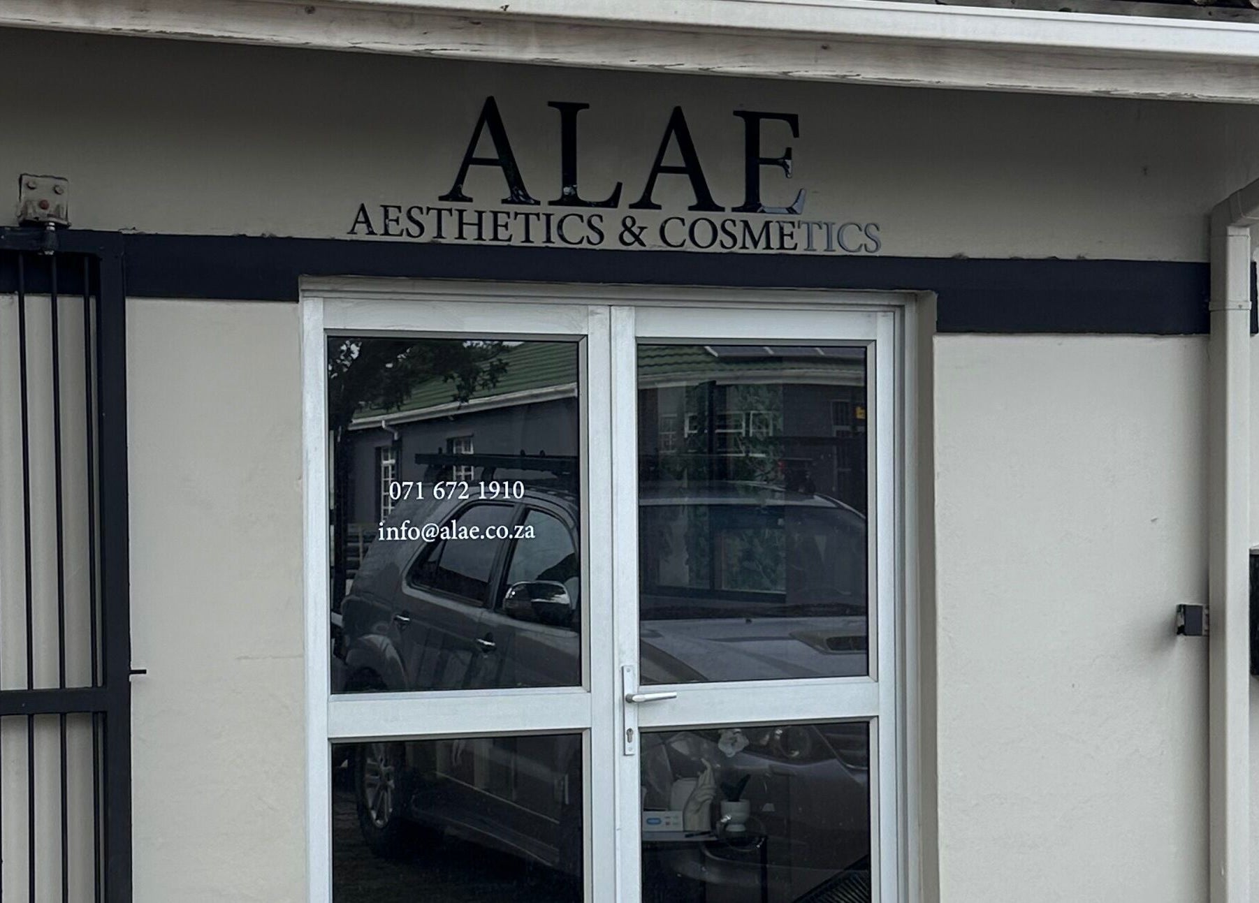 Entrance of Alae Aesthetics & Cosmetics in Gqeberha, Eastern Cape, ZA showcasing sleek design.