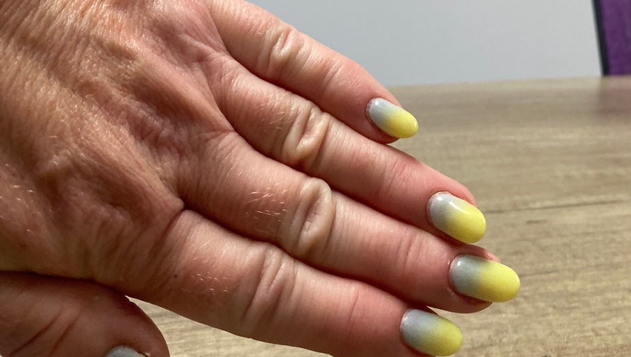 Vibrant ombre yellow nails by Nail tech Norfolk at Wisbech Saint John's Fen End, England, GB.