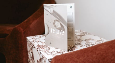 Rejuve Aesthetica brochure on marble table in Sydney, New South Wales, AU.