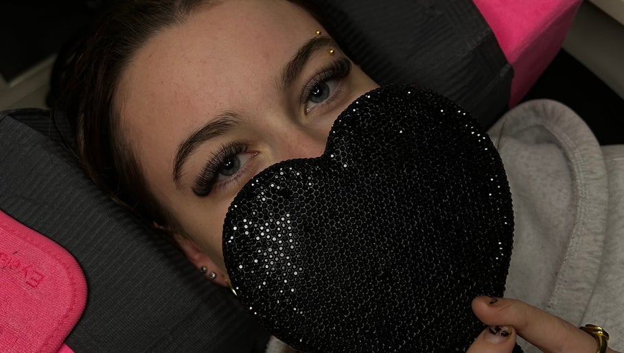 Close-up of eyelashes and a black heart at The Doll Haus, High Wycombe, Western Australia, AU.