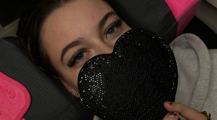 Close-up of eyelashes and a black heart at The Doll Haus, High Wycombe, Western Australia, AU.