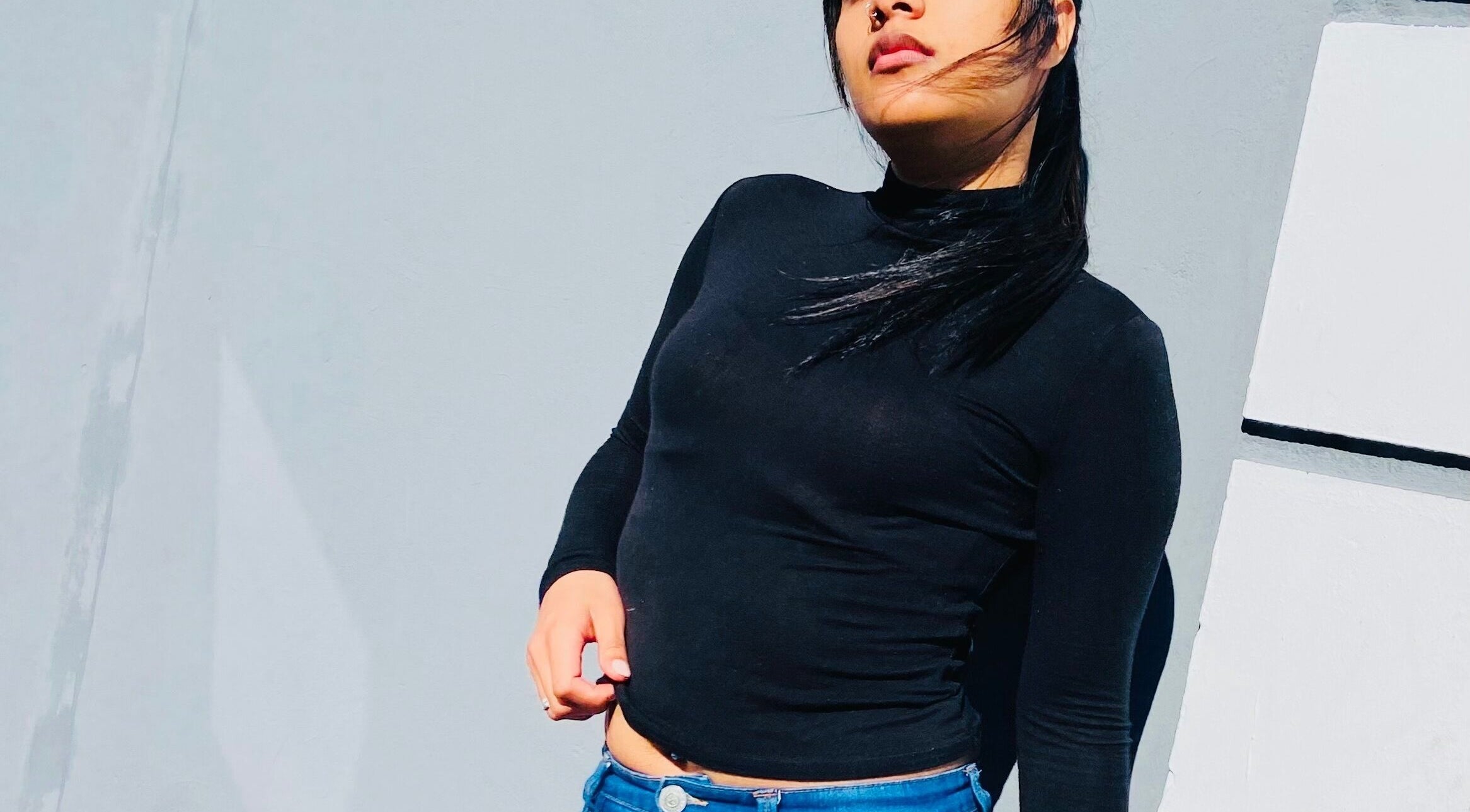 Stylish person in black attire at Mystic Rae's Transformation, Cape Town, Western Cape, ZA.