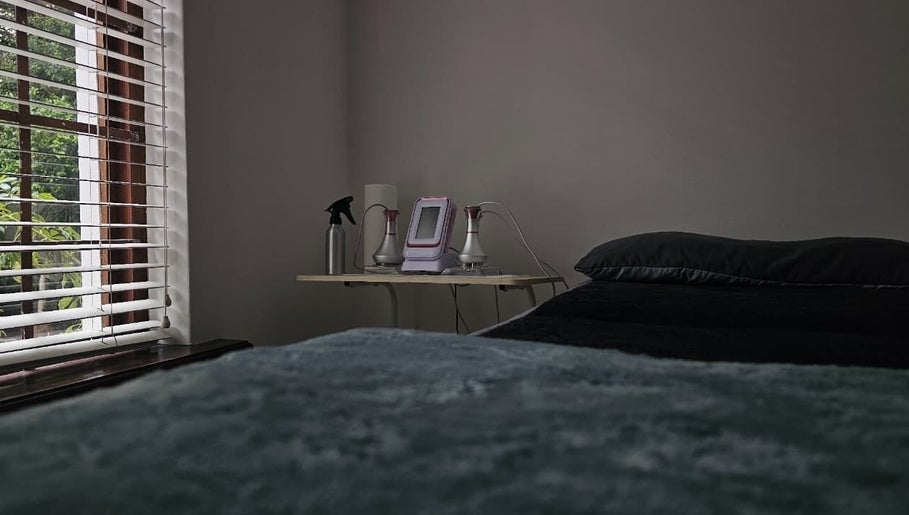 A calming treatment room at The Body Bar in Gqeberha, Eastern Cape, ZA with equipment and soft lighting.