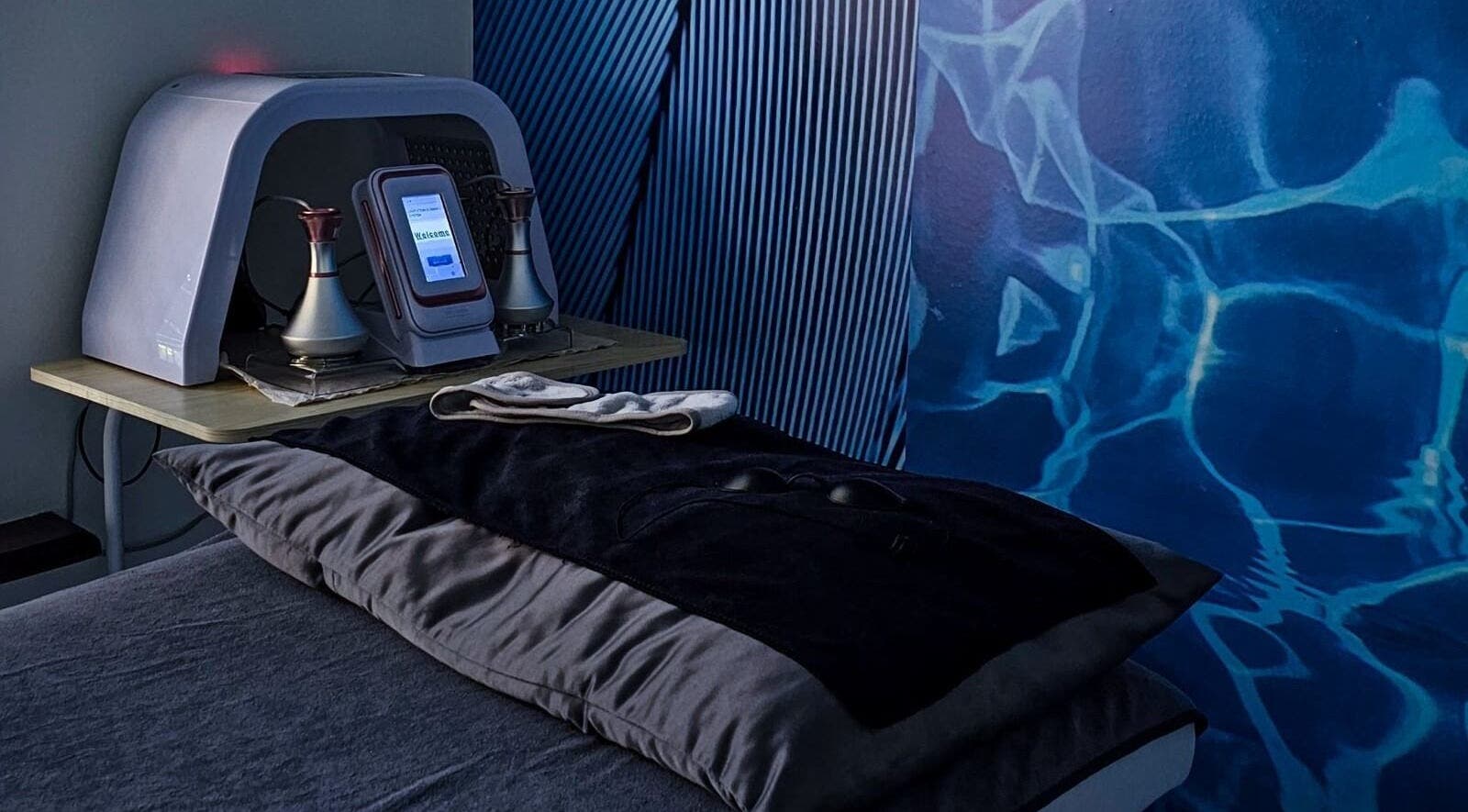 Cozy treatment room at The Body Bar, Gqeberha, Eastern Cape, ZA with modern wellness equipment.