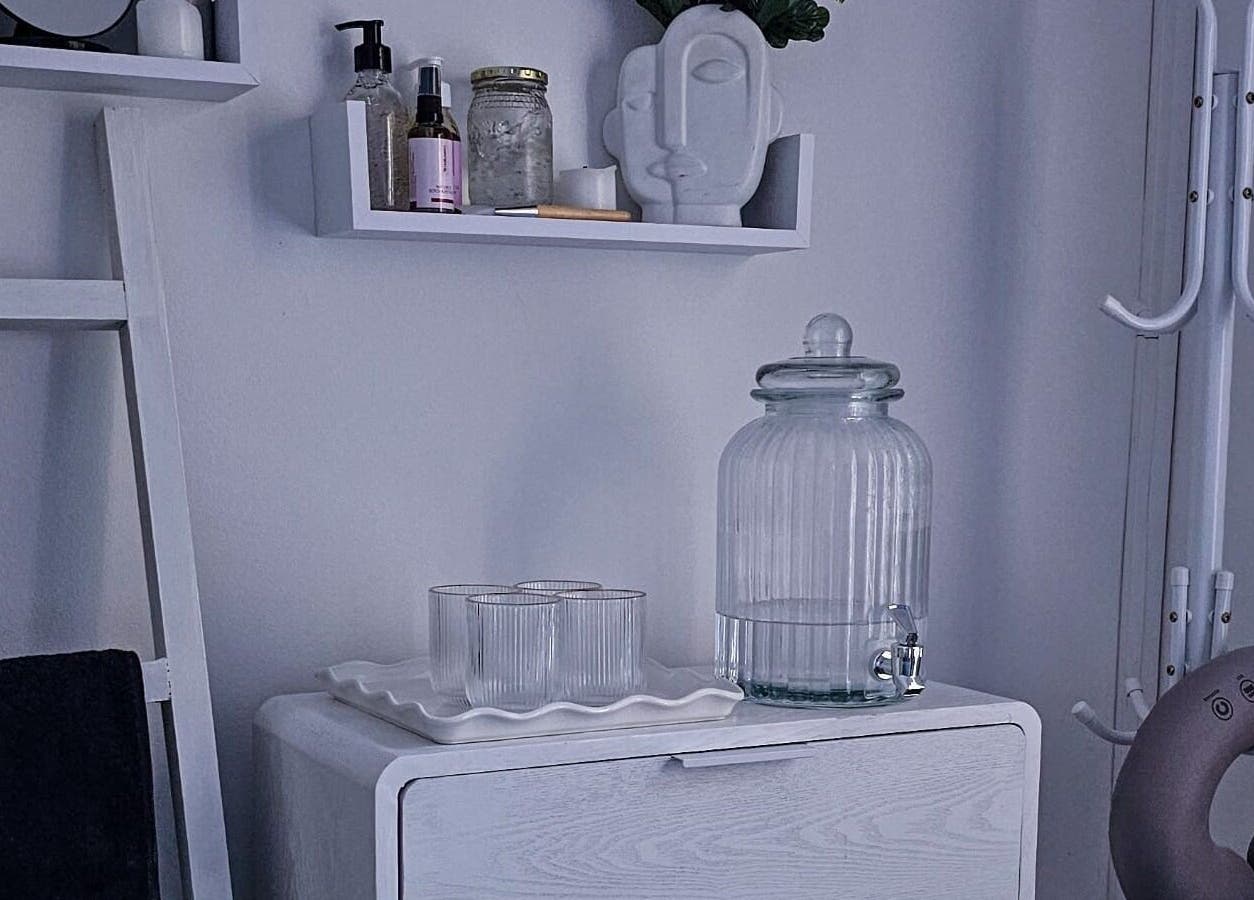 Calm, minimalistic decor at The Body Bar in Gqeberha, Eastern Cape, ZA enhances relaxation and wellness.