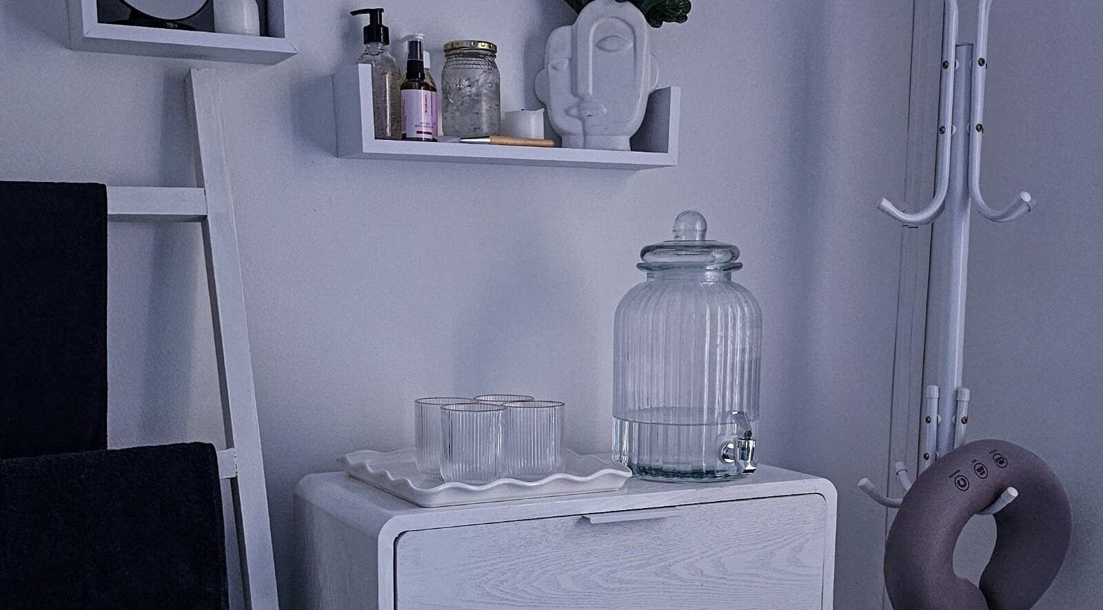 Calm, minimalistic decor at The Body Bar in Gqeberha, Eastern Cape, ZA enhances relaxation and wellness.