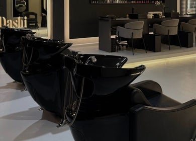 Sleek hair washing stations at DASHI Beauty, Seeb, Muscat Governorate, OM offering relaxing salon experience.