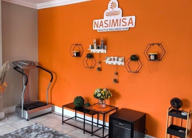 The vibrant entrance of NASIMISA: Health & Wellness Hub in Pretoria, Gauteng, ZA, featuring decor and equipment.