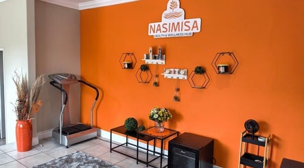 The vibrant entrance of NASIMISA: Health & Wellness Hub in Pretoria, Gauteng, ZA, featuring decor and equipment.
