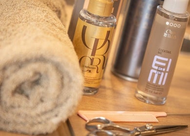Spa essentials at Saxons at Tamworth College, Tamworth, England, GB. Towels, scissors, and oils on display.