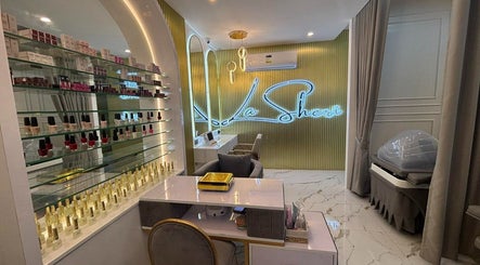 Elegant interior of Banawe Branch, Quezon City, Metro Manila, PH showcasing beauty products and stylish seating.