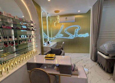 Chic beauty lounge at SM North Branch in QUEZON CITY, Metro Manila, PH, featuring nail polish display and neon decor.