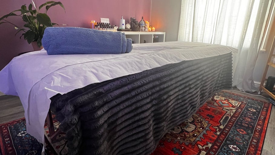 Luxurious treatment bed at Her Sanctuary Holistic Therapies, Leeds, England, GB, enhances relaxation.