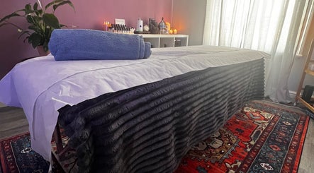 Luxurious therapy room at Her Sanctuary Holistic Therapies, Leeds, England, GB, with a plush massage table.
