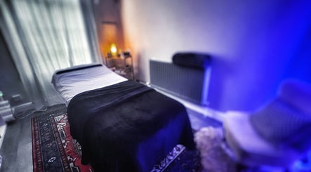 Tranquil therapy room at Her Sanctuary Holistic Therapies, featuring a massage bed in Leeds, England, GB.