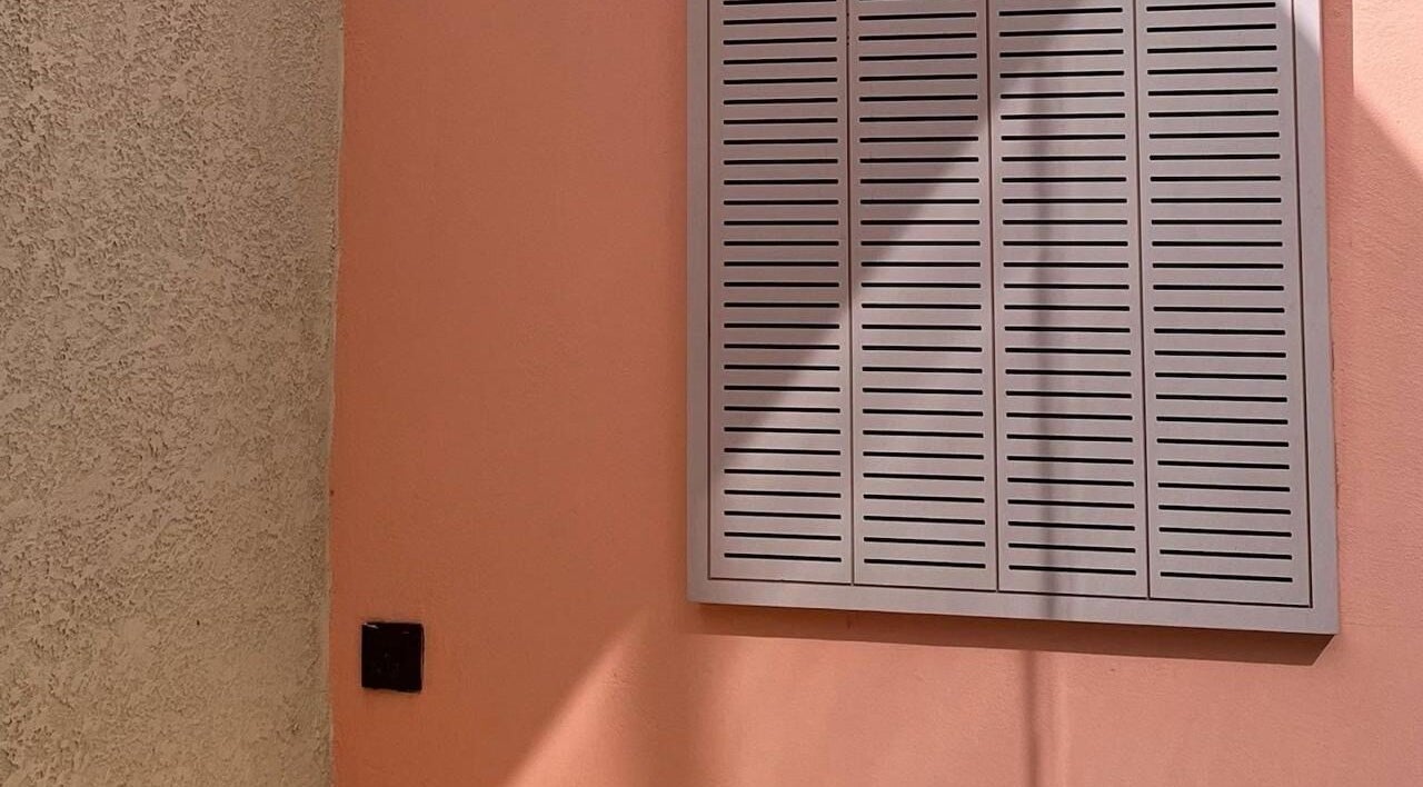 Lapalma boutique's stylish wall with peach tones in Riyadh, Riyadh Province, SA.