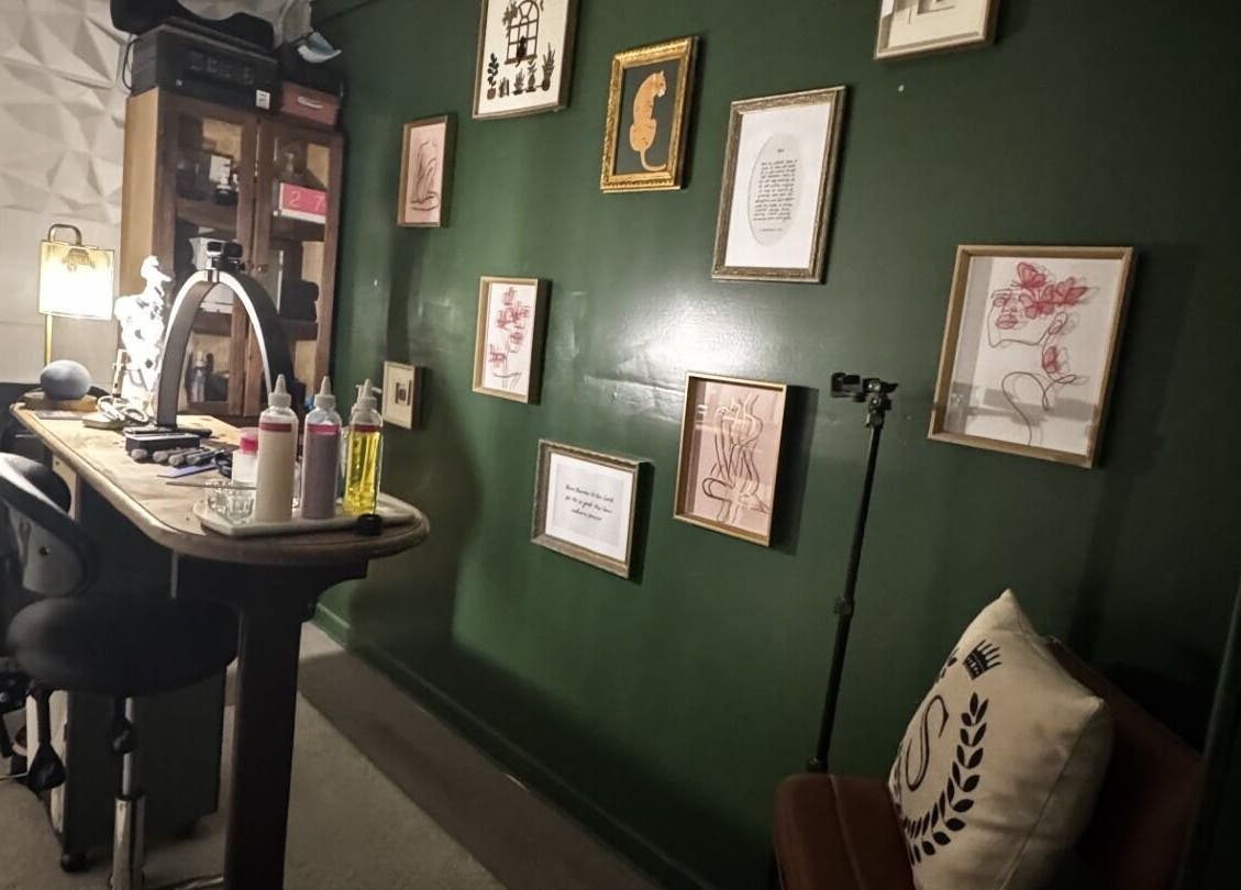 Elegant nail station at Glam N'Glow by Alisha in Winter Haven, Florida, US, with stylish wall art decor.