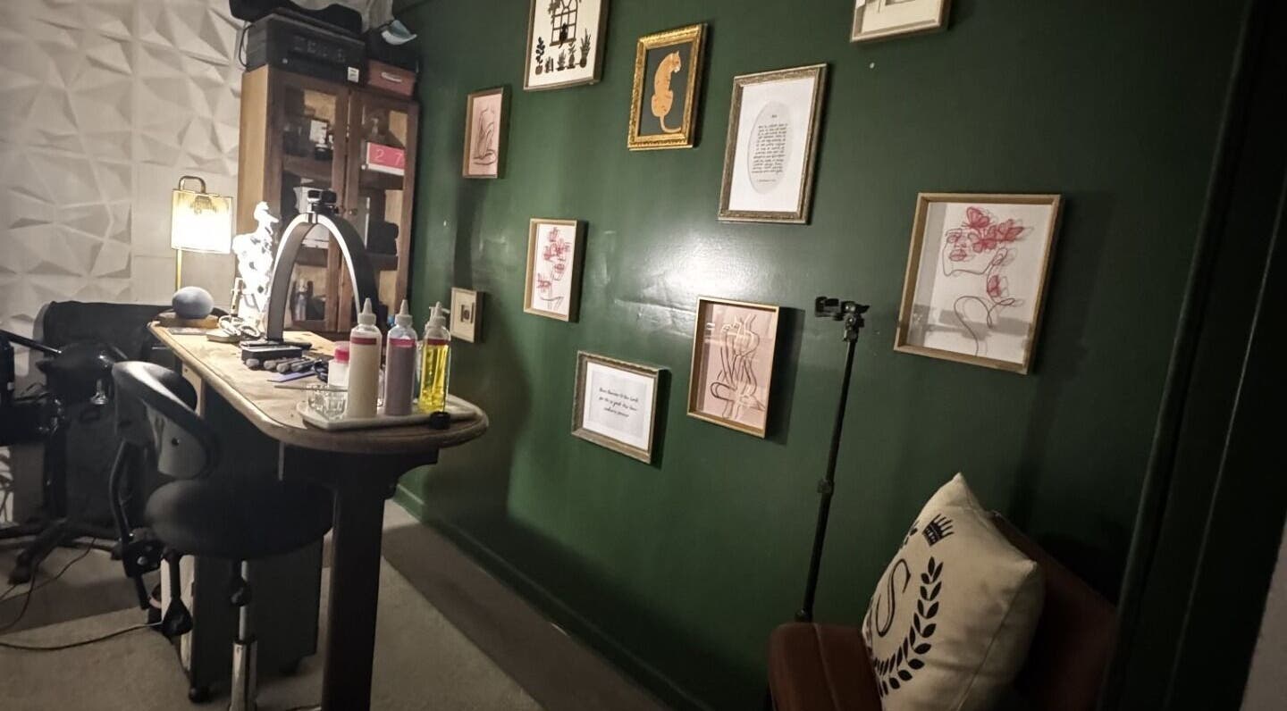 Elegant nail station at Glam N'Glow by Alisha in Winter Haven, Florida, US, with stylish wall art decor.