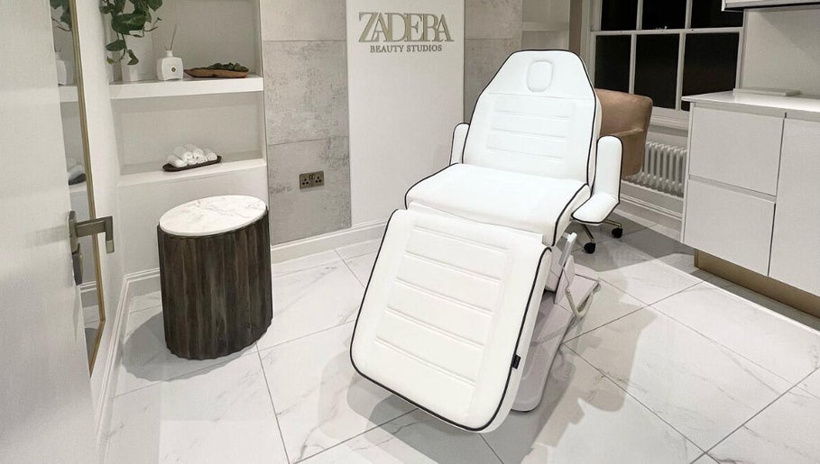 Relaxing spa chair at Brows or Brows, London, England, GB. Clean, white, modern aesthetic for beauty treatments.