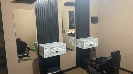 Sophisticated styling station at Natural.E, Philipsburg, SX with sleek mirrors and modern fixtures.