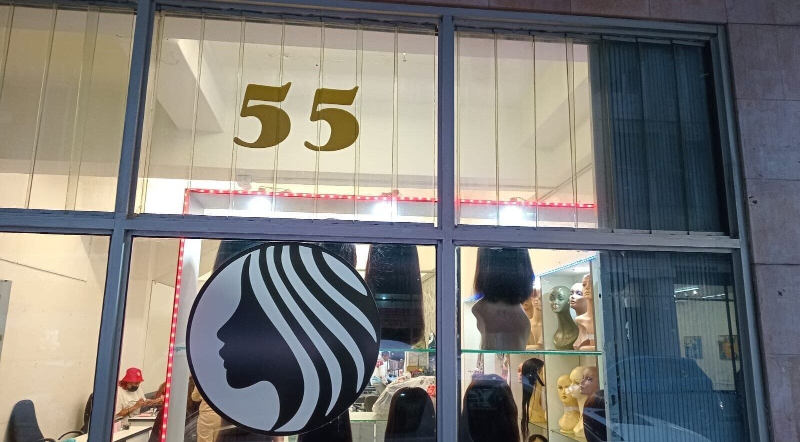 Front of Lavish Looks Hair Studio in Cape Town, Western Cape, ZA showcasing wigs and elegant logo.