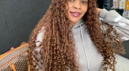 Woman flaunting luxurious curls at Lavish Looks Hair Studio, Cape Town, Western Cape, ZA.