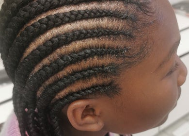 Elegant cornrow style at Lavish Looks Hair Studio, Cape Town, Western Cape, ZA.