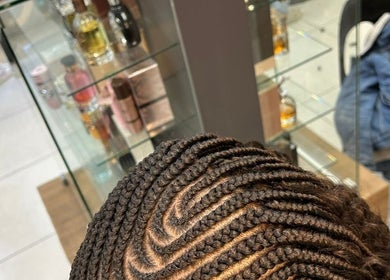 Intricate braided hairstyle at Lavish Looks Hair Studio, Cape Town, Western Cape, ZA.