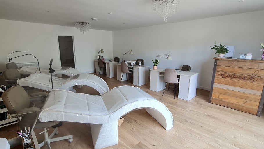 Nails by Claire in Par, England, GB: elegant nail stations and serene spa beds in a stylish setting.