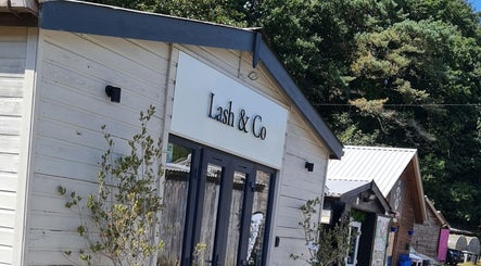 Exterior of beauty venue in Par, England, GB with lush greenery, providing a serene setting at Nails by Claire.