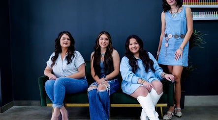 Team at SG Stylez Hair Salon in Wills Point, Texas, US, showcasing trendy denim fashion.