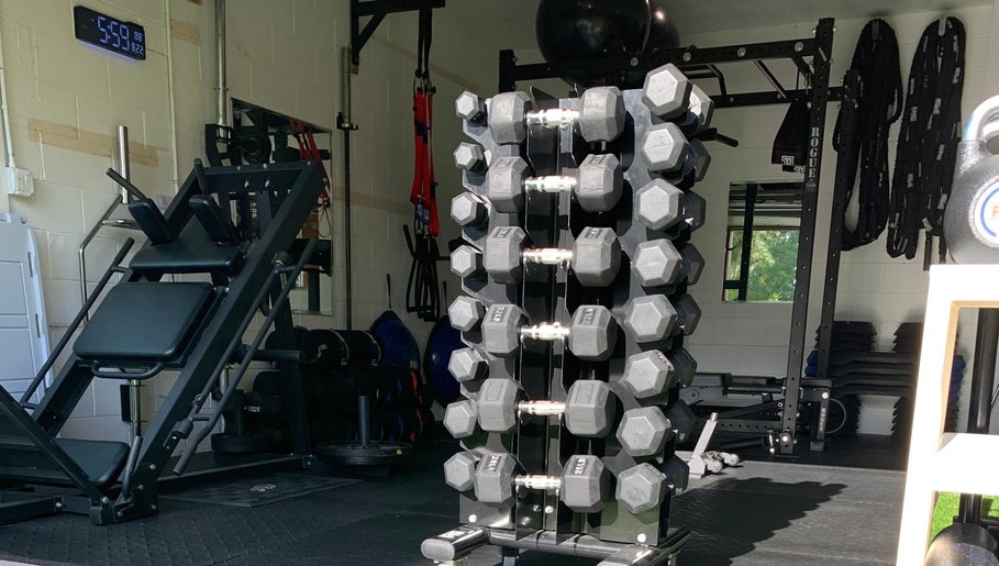 Dumbbells and fitness equipment at TMPL Sports Performance & Lifestyle Fitness, Land O' Lakes, Florida, US.