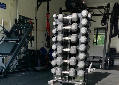 Dumbbells and fitness equipment at TMPL Sports Performance & Lifestyle Fitness, Land O' Lakes, Florida, US.