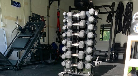 Dumbbells and fitness equipment at TMPL Sports Performance & Lifestyle Fitness, Land O' Lakes, Florida, US.