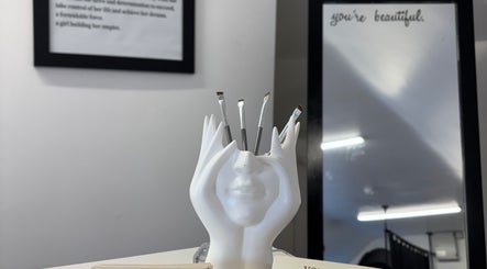 Stylish makeup brush holder at By Chloe Beauty, Ballina, County Mayo, IE, with inspiring decor.